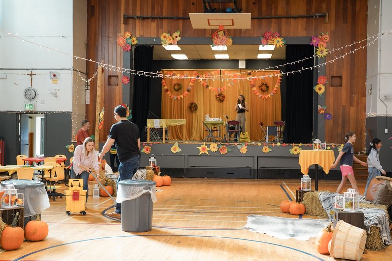 The gym stage dressed for fall